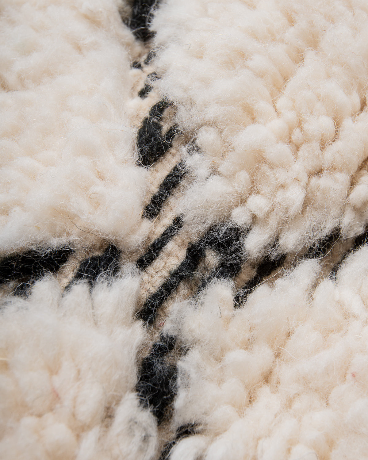 Modern, designer, handcrafted Berber rug from Morocco. Beniourain carpet with beautiful colours and patterns and fluffy wool texture.